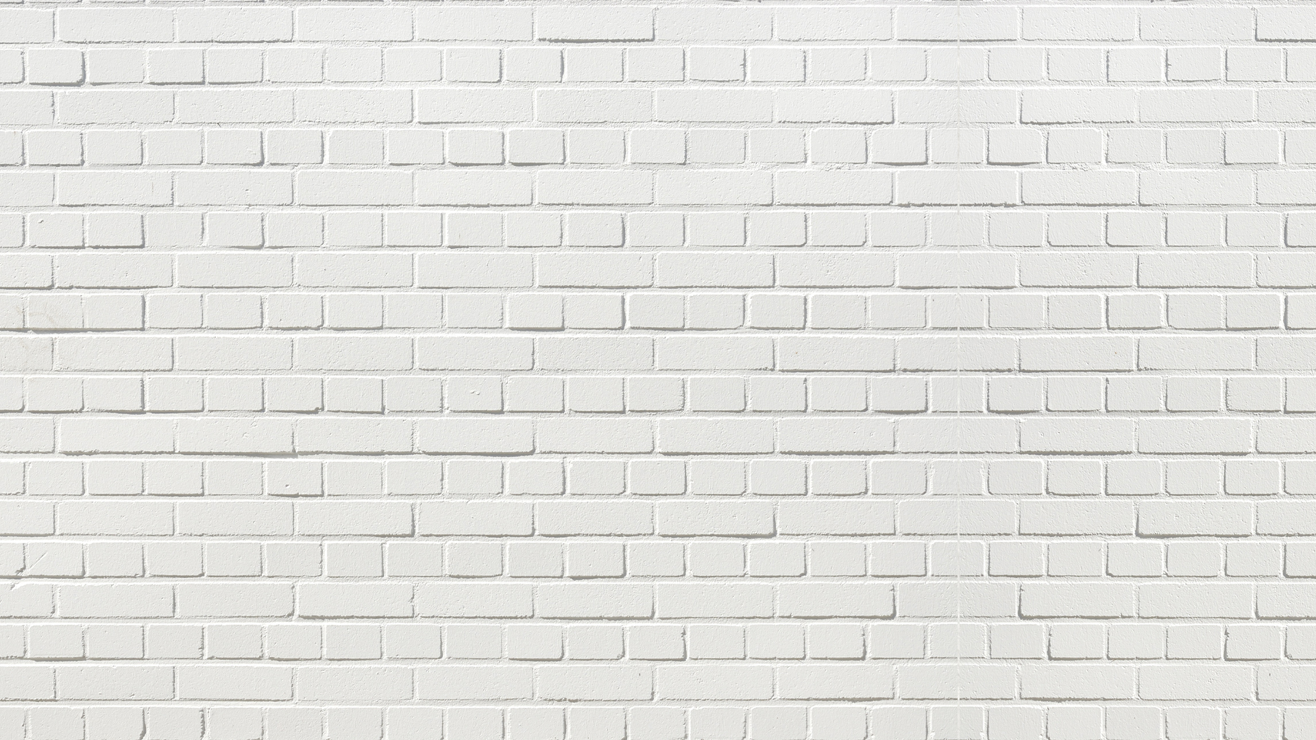 奶白色的砖墙墙壁背景